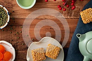 Delicious mung bean moon cake for Mid-Autumn Festival food mooncake on wooden table background