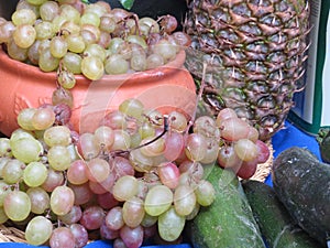 Delicious natural fruits still life grapes pineapple tasty