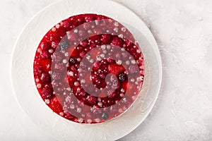 Delicious no baked cheesecake with jelly and summer berries