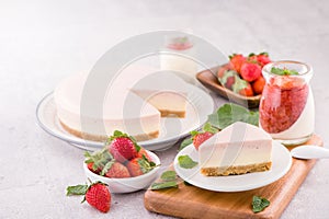 Delicious and nutritious handmade strawberry no bake frozen gradient colour fromage frais cheesecake slice with raw sarcocarp