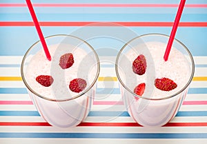 Delicious, nutritious and healthy fresh strawberry yogurt on bright background