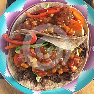 Delicious and Nutritious Vegetable Taco Dish with Beans and Mango Salsa