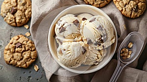 Delicious oatmeal cookies and vanilla ice cream in a bowl with chocolate chips