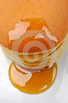 Delicious pancake with organic honey photo