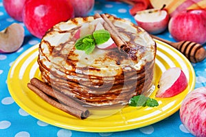 Delicious pancakes, honey, apples, cinnamon