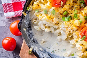 Delicious pasta and cheese casserole in a cast iron skillet