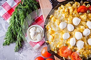 Delicious pasta and cheese casserole in a cast iron skillet