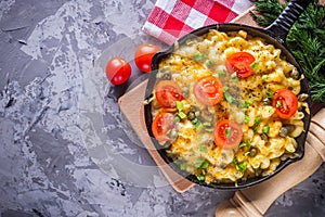 Delicious pasta and cheese casserole in a cast iron skillet