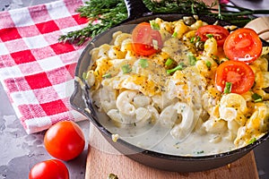 Delicious pasta and cheese casserole in a cast iron skillet