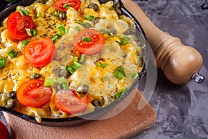 Delicious pasta and cheese casserole in a cast iron skillet