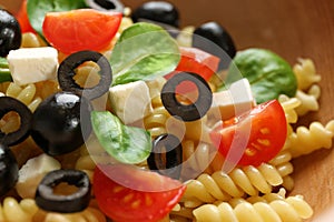 Delicious pasta primavera with olives and cherry tomatoe