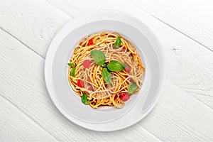 Delicious pasta on white plate on background