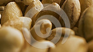 Delicious pastry concept. Stock footage. Close-up of rye grains covered with flour.