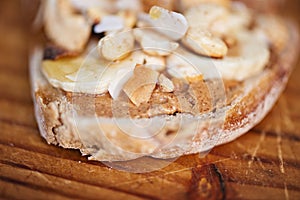 Delicious peanut butter, banana and cashew nut open faced sandwich