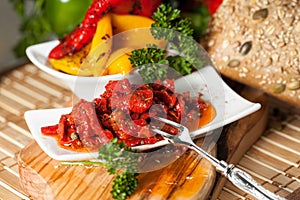 Delicious pepper salad with onions peppers and tomatoes