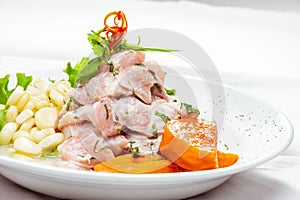 Delicious Peruvian ceviche dish in a white plate