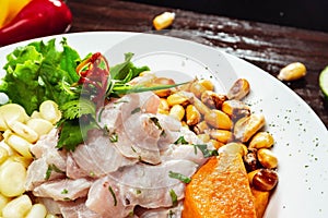 Delicious Peruvian ceviche in a white plate