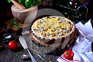 Delicious pie with chicken meat, eggplant, mushrooms, onion and cheese.