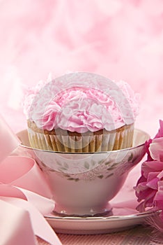 Delicious Pink Cupcake In A Teacup