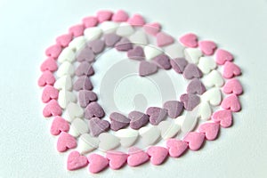 Delicious pink ValentineÃÂ´s Day sugar hearts and ornaments in pink, purple and white show I love you to your beloved girlfriend