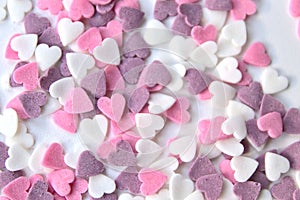 Delicious pink ValentineÃÂ´s Day sugar hearts and ornaments in pink, purple and white show I love you to your beloved girlfriend