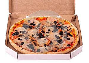 Delicious pizza with ham, mozzarella, mushrooms and olives in cardboard box, isolated on white background
