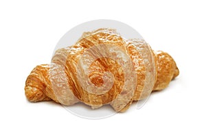 Delicious plain croissant isolated on white background