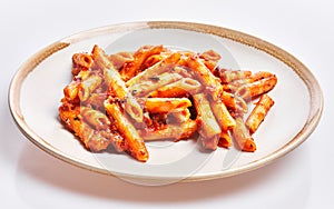 Delicious plate of italian macaroni with tomato sauce over isolated white background