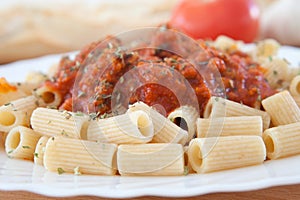 Delicious plate of macaroni with tomato