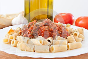 Delicious plate of macaroni with tomato