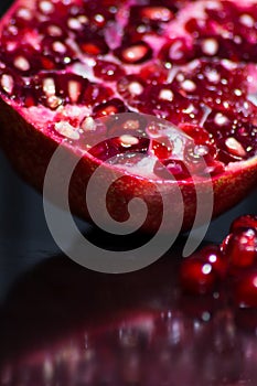 Delicious pomegranate seeds. Juicy Ripe Red Granets or Garnets.  Closeup view of Grain Red Grenades.