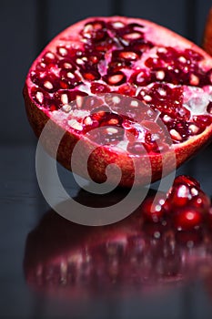 Delicious pomegranate seeds. Juicy Ripe Red Granets or Garnets.  Closeup view of Grain Red Grenades.
