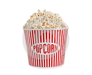 Delicious popcorn in paper bucket isolated
