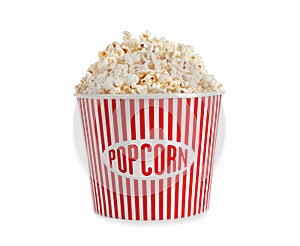 Delicious popcorn in paper bucket isolated