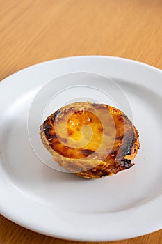 Delicious Portuguese custard tart, golden and creamy. photo