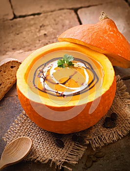 Delicious pumpkin or butternut soup photo