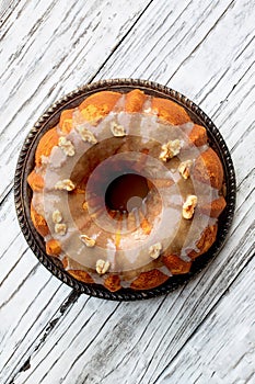 Delicious Pumpkin Spice Bundt Cake with Brown Sugar Frosting and Walnuts