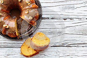 Delicious Pumpkin Spice Bundt Cake Slices with Brown Sugar Frosting