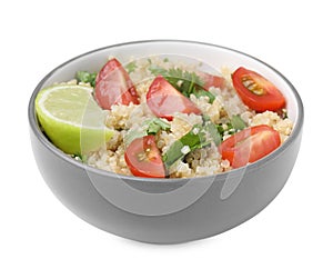 Delicious quinoa salad with tomatoes, parsley and lime isolated on white