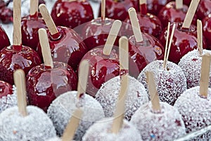 Delicious red candy apples covered with sprinkles
