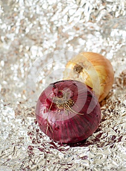 a delicious red onion over a tin paper