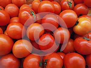 Delicious red tomatoes. Summer tray market agriculture farm full of organic vegetables It can be used as background