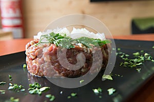 delicious red tuna tartare with onion and parsley