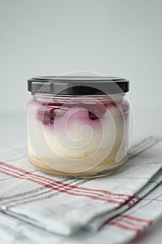 Delicious red velvet cake jar in white background