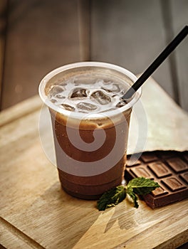 Delicious and refreshing coffee based beverage, ice coffee, cold drink, coffee beans photo