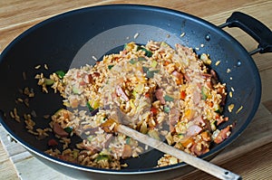 Delicious rice with stewed vegetables and sausages