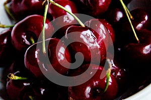 Delicious ripe cherry close - up with drops