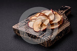 Delicious ripe red apple, sliced and dried in a special dryer