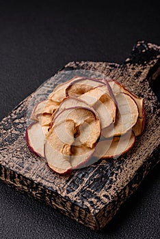 Delicious ripe red apple, sliced and dried in a special dryer