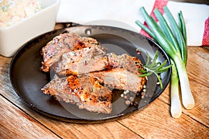 Delicious roast ribs, homemade prepared pork ribs and spring onion